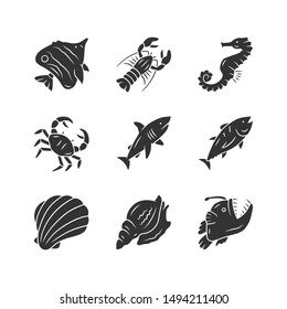 Marine animals glyph icons set. Swimming shark, anglerfish. Underwater creature. Aquatic organism. Seafood restaurant. Lobster, crab, tuna. Silhouette symbols. Vector isolated illustration