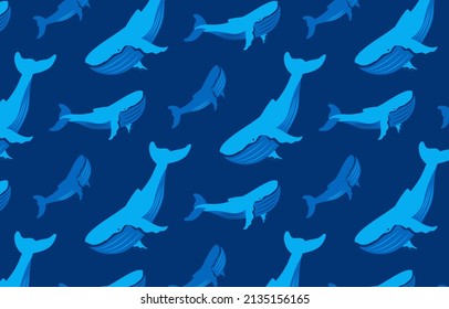 Marine pattern with whales on blue background