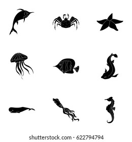 Marine and river inhabitants. Fish, whales, octopuses.Sea animals icon in set collection on black style vector symbol stock illustration.