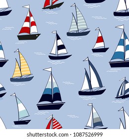 Marine seamless pattern with cartoon boats on blue background