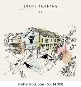 Market place in Luang Prabang, Laos, Southeast Asia. French colonial buildings on the background. Vintage hand drawn touristic postcard in vector