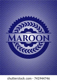 Maroon badge with denim texture