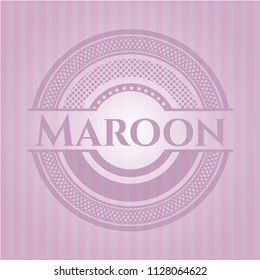 Maroon badge with pink background