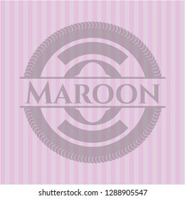 Maroon badge with pink background