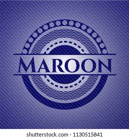 Maroon emblem with jean background