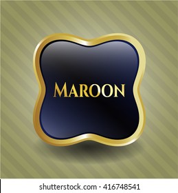 Emblema dorado maroon
