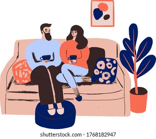 Married couple relaxing together. People men and women sitting on a couch drink tea or coffee.