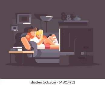 Married couple watching TV