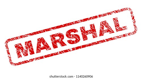 MARSHAL stamp seal print with distress style. Red vector rubber print of MARSHAL label with unclean texture. Text label is placed inside rounded rectangle frame.