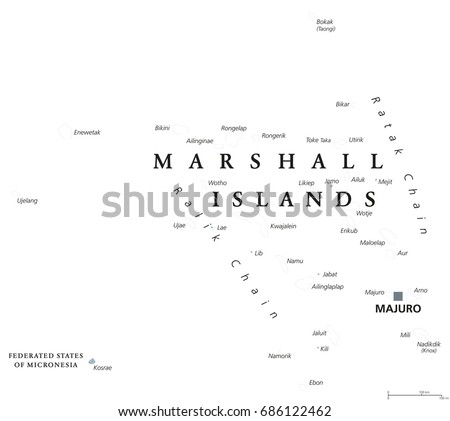 Marshall Islands political map with capital Majuro. Republic and country in the Pacific Ocean consisting of coral atolls and islands. English labeling. Gray illustration on white background. Vector.