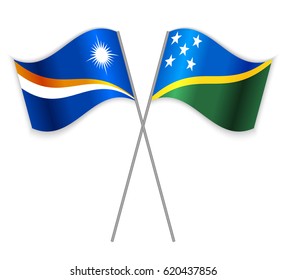 Marshallese and Solomon Island crossed flags. Marshall Islands combined with Solomon Islands isolated on white. Language learning, international business or travel concept.