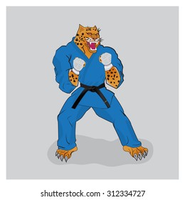 Martial arts fighter leopard in the blue gi with black belt