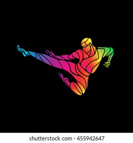 Martial arts jump kick color rainbow silhouette. Karate fighter