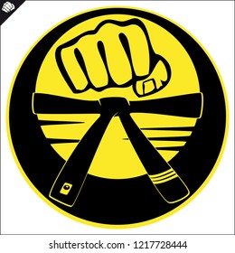 Martial arts. Karate fighters fist logo silhouette Vector. EPS.