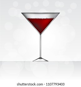 Martini glass vector illustration with red martini, with blurred background 