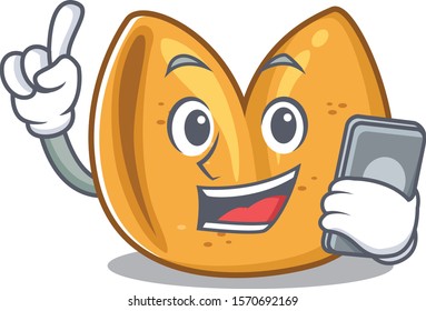 mascot cartoon style of fortune cookie speaking With phone