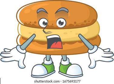 Un diseño de mascota de macarones de chocolate haciendo un gesto sorpresa