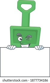 Mascot design style of green sand bucket standing behind a board. Vector illustration