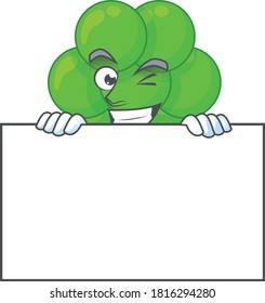 Mascot design style of staphylococcus aureus standing behind a board. Vector illustration