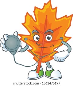 Mascot a doctor in the cartoon orange autumn leaves