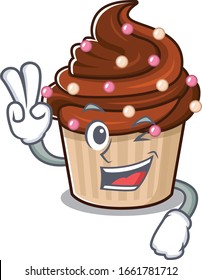 mascot of funny chocolate cupcake cartoon Character with two fingers