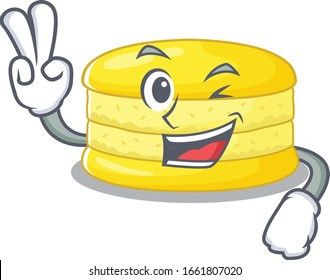 mascot of funny lemon macaron cartoon Character with two fingers