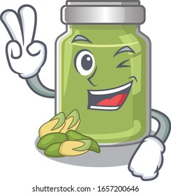mascot of funny pistachio butter cartoon Character with two fingers