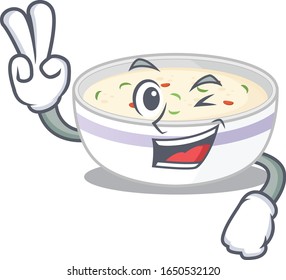 mascot of funny steamed egg cartoon Character with two fingers