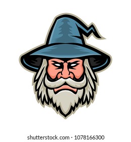 Mascot icon illustration of head of a black wizard, sorcerer or magician, a practitioner of magic and witchcraft wearing a pointed hat viewed from front on isolated background in retro style.