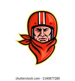 Mascot icon illustration of head of a male biker or motorcycle club rider wearing a vintage helmet and bandanna or scarf viewed from front on isolated background in retro style.