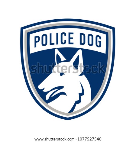 Mascot icon illustration of head of a police dog, German Shepherd, Alsatian wolf dog or sometimes abbreviated as GSD looking to side set inside shield or crest isolated background in retro style.