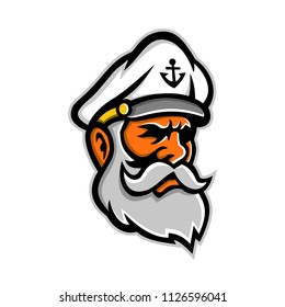 Mascot icon illustration of head of a seadog or sea dog, an old or experienced sea captain, sailor or fisherman viewed from side on isolated background in retro style.