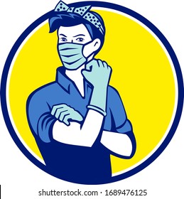 Mascot illustration of American Rosie, the riveter as medical healthcare essential worker wearing a surgical mask flexing muscle set inside circle done in retro style.