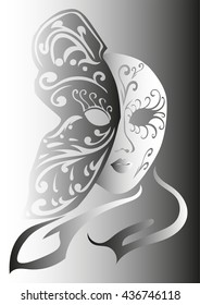 mask of a human face with an ornament in the form of a butterfly wing patterns and background color
