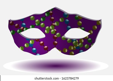 Mask in the traditional colors of Mardi Gras.