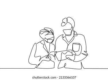 masked doctor scientists showing tablet and documents to each other they are analyzing