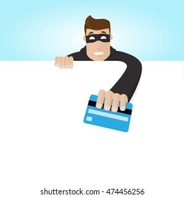 Masked man take a creditcard