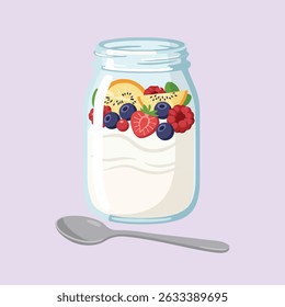 A mason jar filled with creamy yogurt topped with berries and kiwis and a spoon.