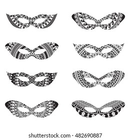 Masquerade mask silhouettes with ornament elements