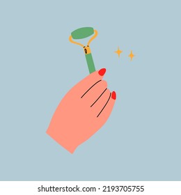 Massage roller for face made of green stone.