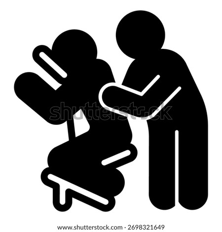 Masseur with man at salon chair solid icon, spa massage concept. Vector graphics. Massaging art for client back, therapy sign on white background, glyph style icon for mobile or web design