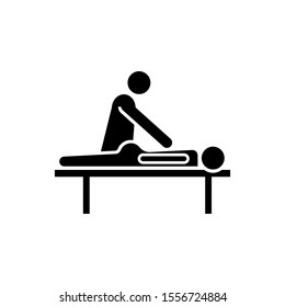 masseur massaging a girl lying on a massage table face down icon