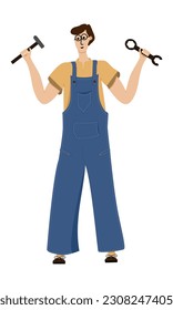 Master in overalls with a tool in his hands. Worker with a hammer and a wrench is preparing to work