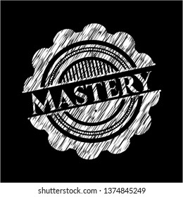 Mastery chalkboard emblem written on a blackboard