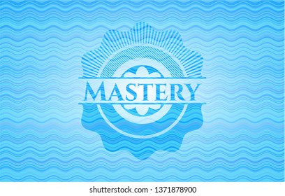 Mastery light blue water wave style badge.