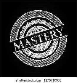 Mastery written on a chalkboard