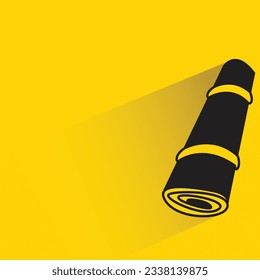 mat roll with shadow on yellow background