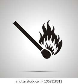 Match with fire icon, simple black silhouette on gray
