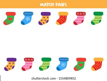 Match pairs of colorful socks. Educational worksheet for preschool kids