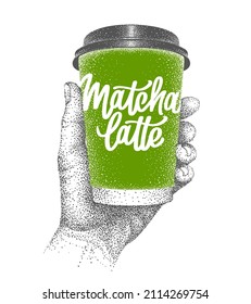 Matcha latte to go. Green tea takeaway. Takeout. Paper cup in human hand. Hand-drawn sketch in pointillism with lettering. Vector illustration.
